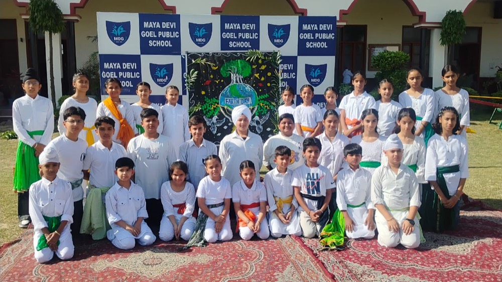 Students celebrating Earth Day at MDG Public School